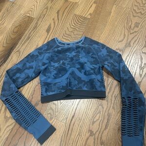 Crop blue athletic top with back detailing wore few time perfect condition